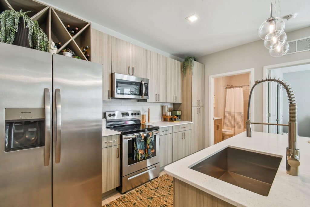 Kitchen featuring stainless steel appliances, built in microwave, and more